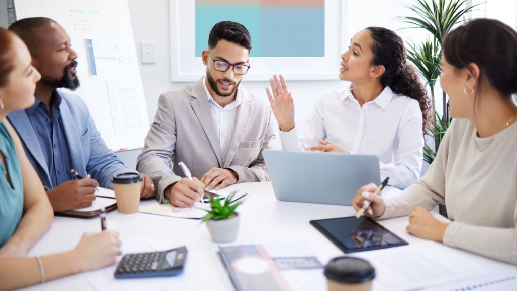 business team reviewing SEO success charts and performance metrics with Ai SEO agency